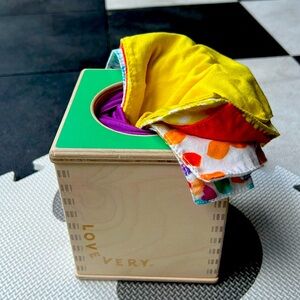 Wood tissue box toy Lovevery